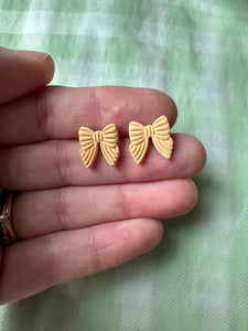 Mini Bow Studs, in Butter